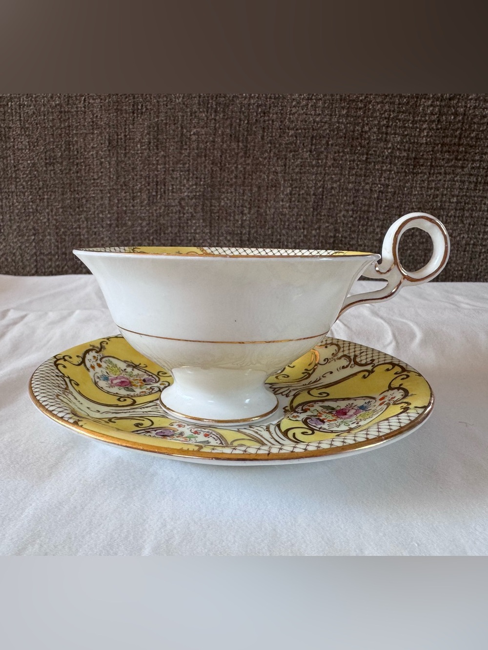 Vintage Yellow Floral Footed Teacup and Saucer Set